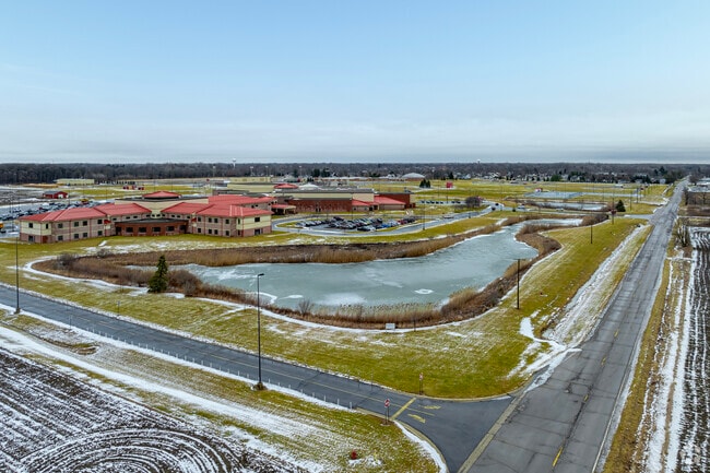 A pair of ponds gives Milan High School a scenic quality.