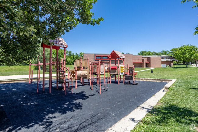 Jefferson Elementary School features a tree-shaded playground.