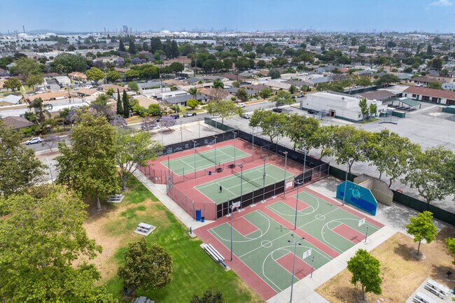 Foisia Park has lighted tennis and basketball courts and a picnic area among the trees.