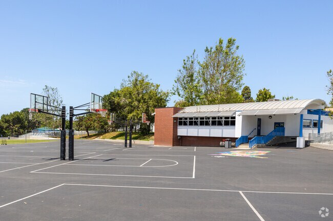 Students practice basketball at Pennekamp Elementary School in Manhattan Beach, CA.