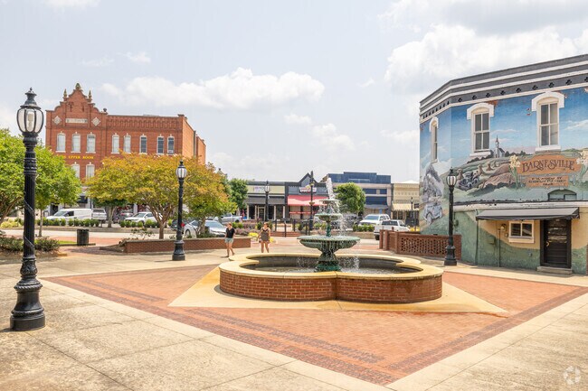 Residents can enjoy the fountain and large murals found around the small downtown area of Barnesville, GA.