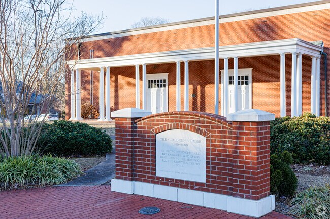 A memorial honoring the founders is present at Kingswood School.