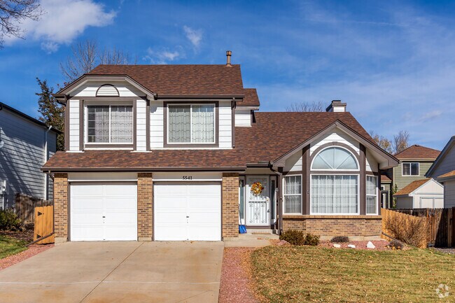 This mid-century modern home in Sheridan Green has a two-car garage and large backyard.