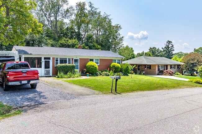 Streets in Airport Acres are lined with ranch-style homes.
