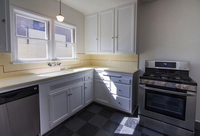 Kitchen with gas stove and dishwasher