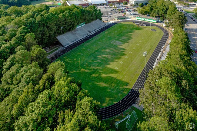 Cary High School includes a football field and track in Crossroads.