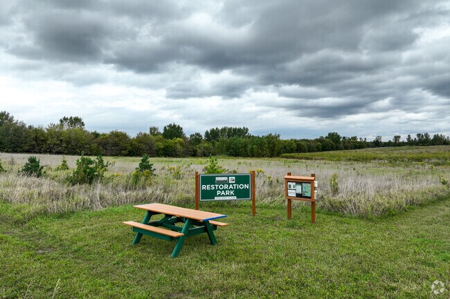 Sit down for a picnic at Restoration Park.