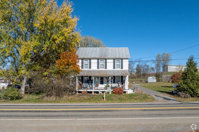 Colonial-style homes appear along Madison Township’s winding roads.