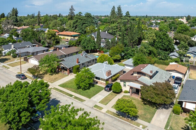 Residents of the Tower District enjoy the mature shade trees and walkable streets.
