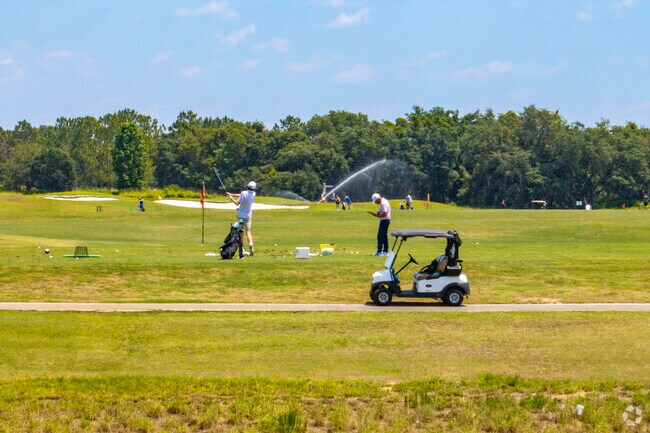 Golfers enjoy playing at Orange County National Golf Center in Horizon West.