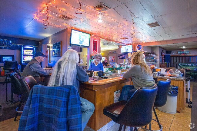 Renner Corner Residents raise a glass to good times at Monarch Steak House & Lounge.