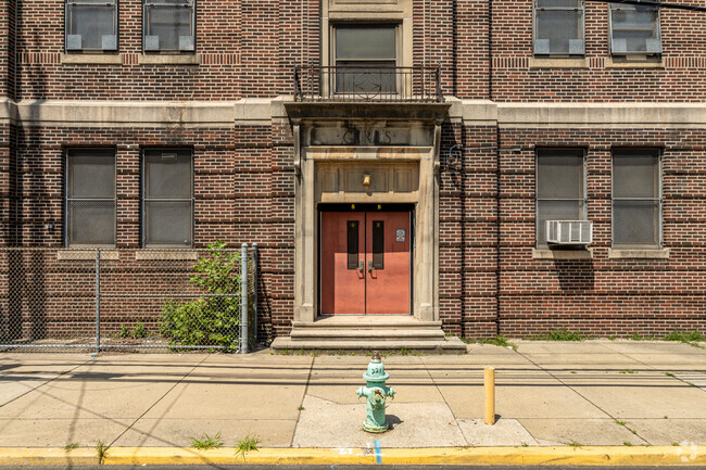 The familiar red doors at Pride Academy greet students as they arrive ready to learn.
