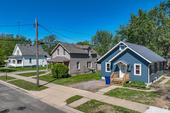 Homes in the Saint John Cantius neighborhood feature modest design and lot size.