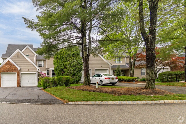 Nestled beneath mature trees, these cozy townhomes offer low-maintenance living with the feel of a quiet suburban hideaway—perfect for planting roots or starting fresh.