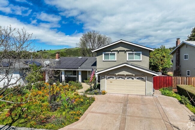 It's common to see homes with fresh green yards and homes with their own solar systems in Graystone.