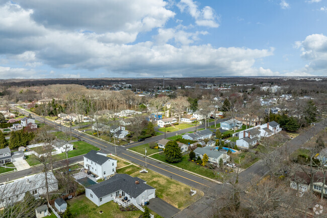 A bird's eye view revealing the tranquil neighborhoods of Oakhurst, NJ.