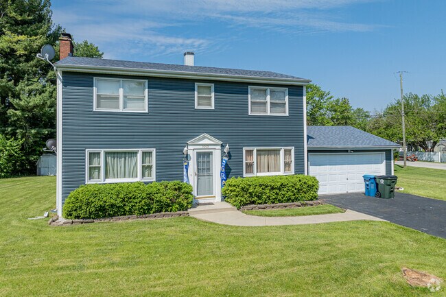 Pine Knoll features many newer traditional homes with attached garages.