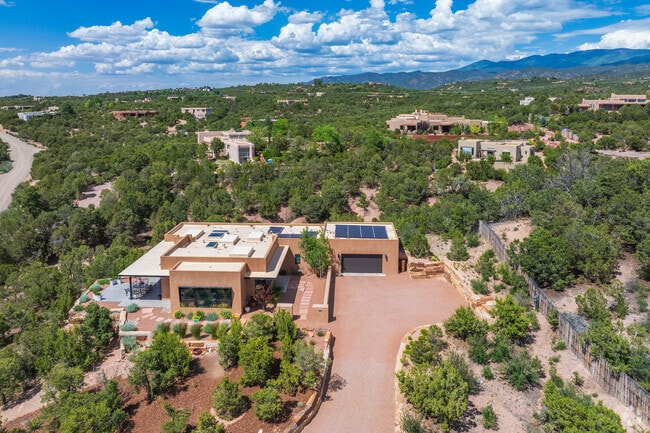 The Sangre de Cristo Mountains provide a beautiful backdrop to homes located in Tesuque.