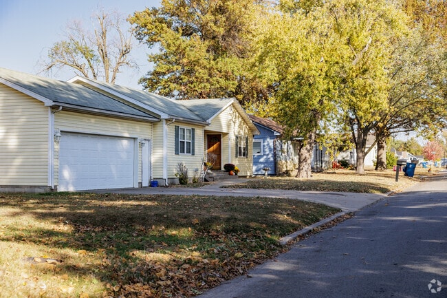 Many homes in Fairview have large mature trees on their lots.