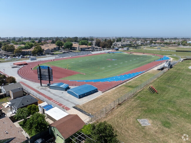 Diverse extracurriculars include football, soccer, and volleyball.