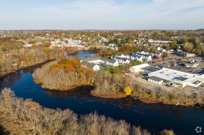 Centreville sits on the shores of the Pawktucket River with many homes and retail at its edge.
