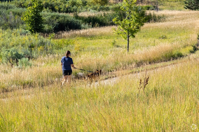 Outdoor enthusiasts and their dogs enjoy miles of trails near Tollgate Crossing.