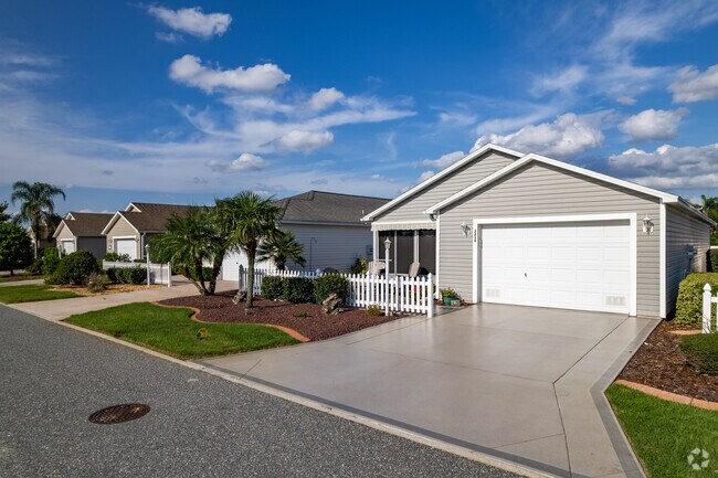 A beautiful row of zero-lot-line patio villas in the Village of Saint Charles.