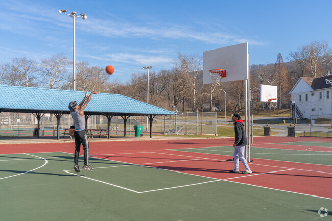 Shoot hoops at City Park Basketball Courts in Reading.