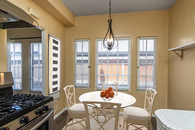 Eating area with lots of natural light through many windows
