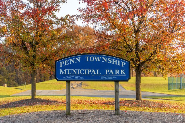 Penn Township Municipal Park has basketball courts, open green space, and a playground.
