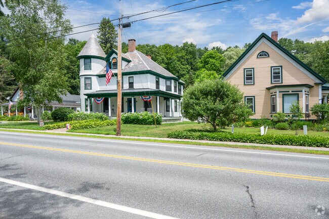 A line of stunning homes lines a quiet street in Hartland.