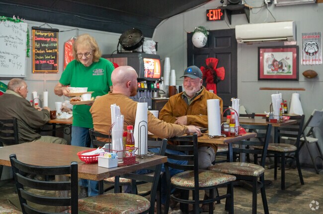 Service with a smile at the Two Sisters Cafe.