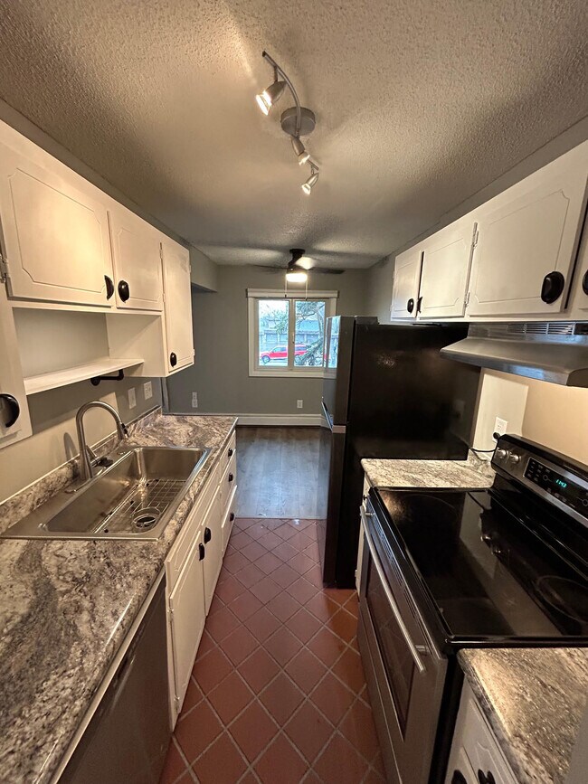 Stainless Appliances in Galley Kitchen