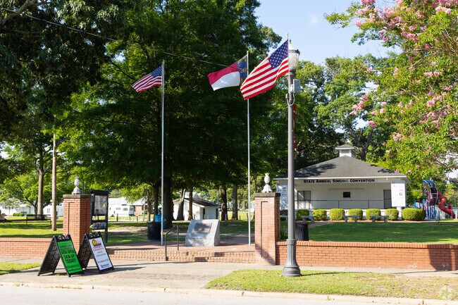 Locals can catch a live music performance at Benson Singing Grove in the Summer.