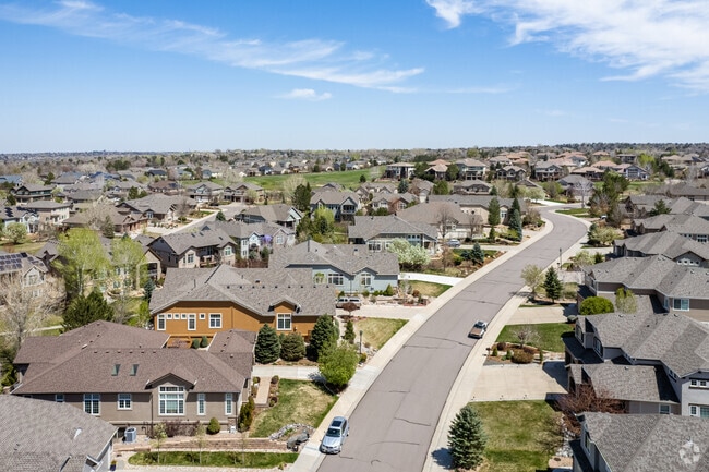 The streets are full of large colorful homes in the Westcliff and Cambridge neighborhood in Westminster, Colorado.