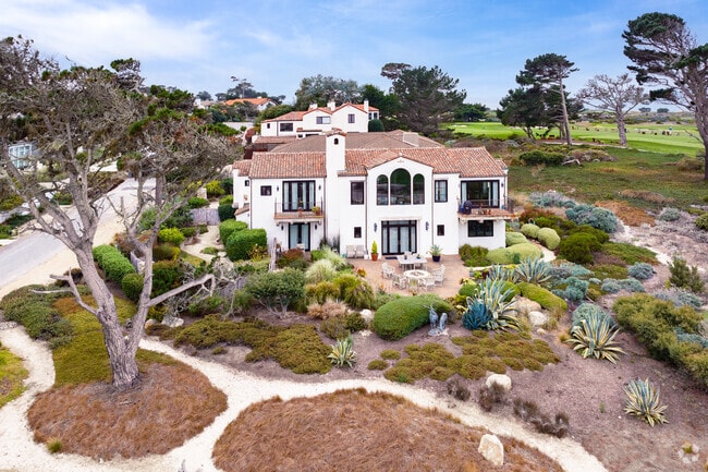 Spanish-inspired mansions in Pebble Beach, California, sit right on the green.