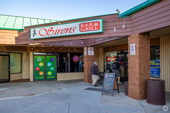 Sirens Bar & Grill has a small patio, pool tables & pub fare in unpretentious surroundings.