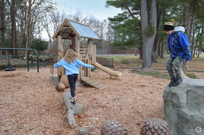 Kids in Wenham enjoy the playground at Pingree Park.