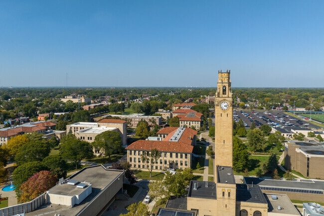 The clock tower rises above the University of Detroit Mercy campus and Pilgrim Village.