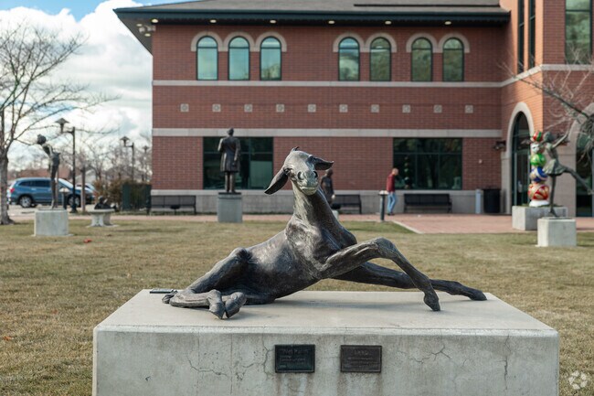 Bronze statues adorn the lawn at Springville Civic Center in Westfields North.