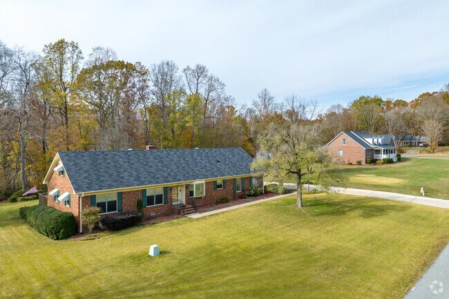 Homes sit on medium-sized lots in Burnetts Chapel/Coltrane Mill.