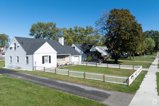 A picket fence surrounds the yard of this well-maintained ranch home in Market Heights.