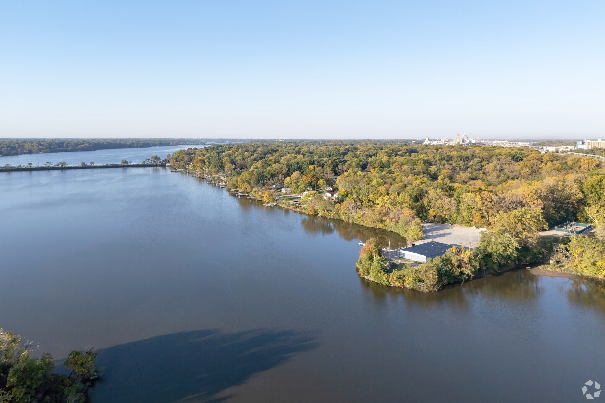 The lake and Lakeview neighborhood are nestled in communion with the clear Illinois sky.