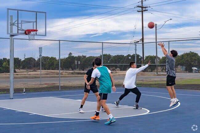 Dinuba residents enjoy practicing basketball at the courts of KC Park.