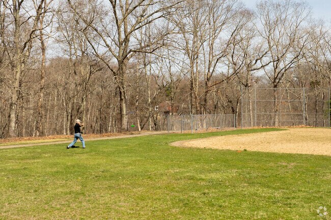 A man plays disc golf at the Garrison Park Disc Golf Course in Chaplin.