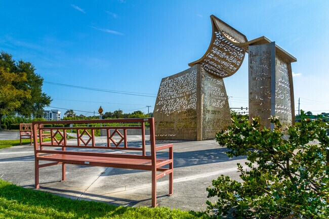 Enjoy a nice book under the pen book gateway sculpture at the Fruitville library.