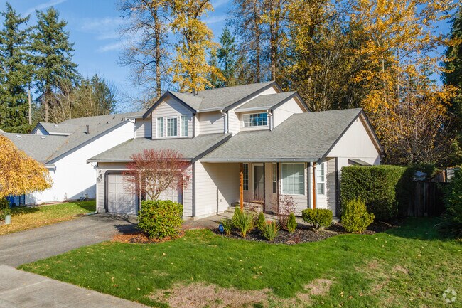 Wood-clad homes in Clover Creek reflect its farming heritage and rustic charm.