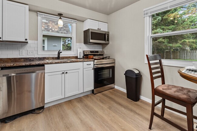 Kitchen with full size stainless steel applicances