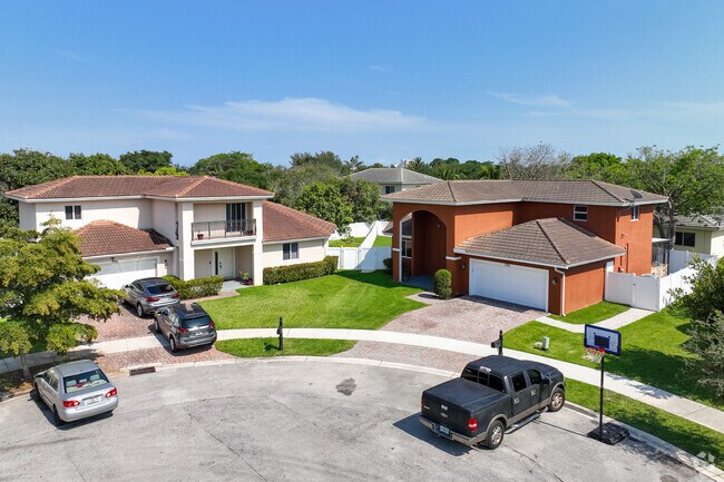 Experience the vibrant allure of modern single-family homes in Northwest Pompano.