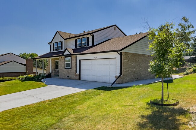 Quaint two story home in Willow Creek with attached garage.